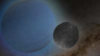 A large glowing blue sphere next to an overlapping smaller grey sphere with a craggy texture